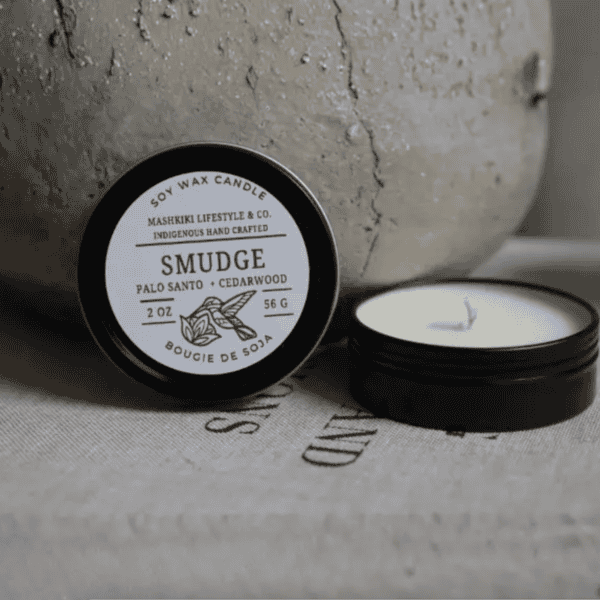 Mashkiki Smudge 2 oz soy wax candle tin in Palo Santo + Cedarwood, lid off