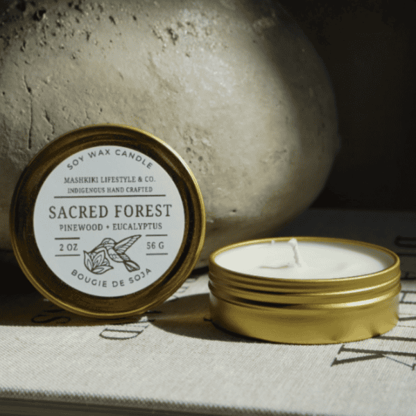 Mashkiki Sacred Forest 2 oz soy candle in a gold tin, Pinewood + Eucalyptus, lid off