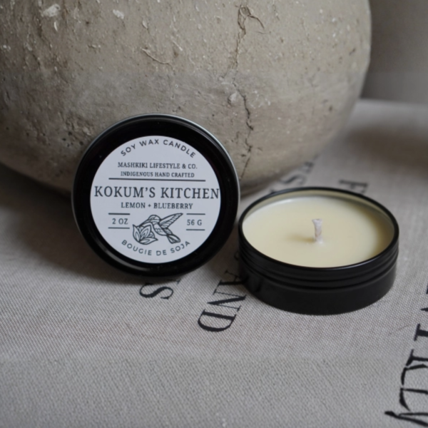 Mashkiki Kokum's Kitchen 2 oz soy candle in a black tin, Lemon + Blueberry, lid off