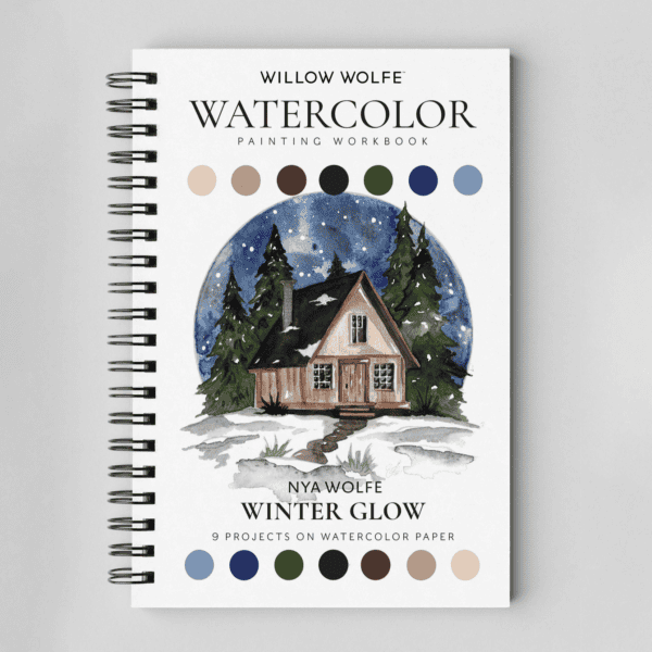 Winter Glow watercolour painting workbook by Nya Wolfe, front cover with a snowy cabin under a starry sky