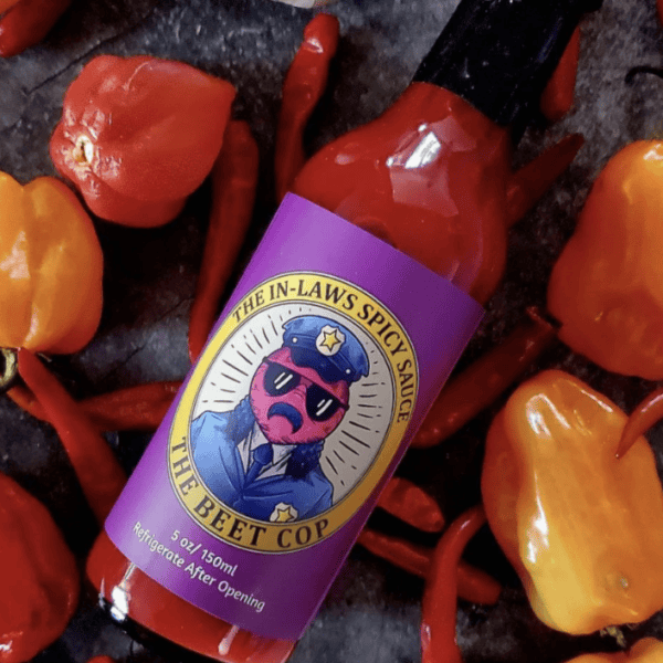 Bottle of The Beet Cop hot sauce by In-Laws Spicy Sauce, 150ml, with habanero and ghost peppers