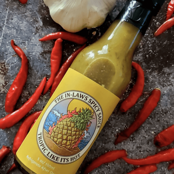 Bottle of Tropic Like Its Hot pineapple habanero hot sauce by In-Laws Spicy Sauce, 150ml